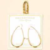 Secret Box Gold Dipped Elongated Oval Hoop Earrings